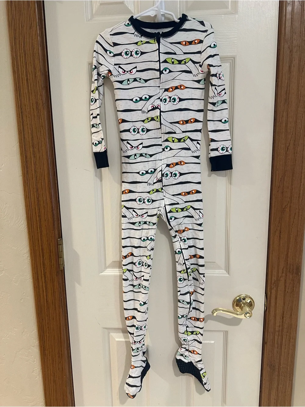 Old Navy White Striped Monster Eyes Footed One-Piece Pajamas with Navy Trim